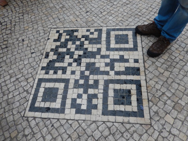 This is one of those codes you can scan with your phone, right in the mosaic